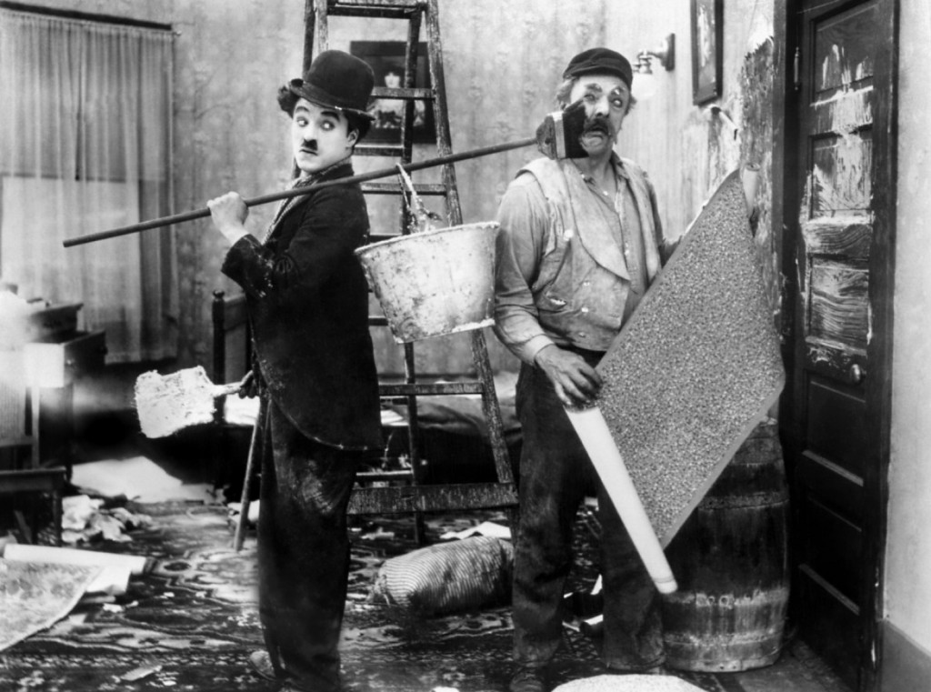 Charlie Chaplin and Charles Inslee in His New Job (1915)