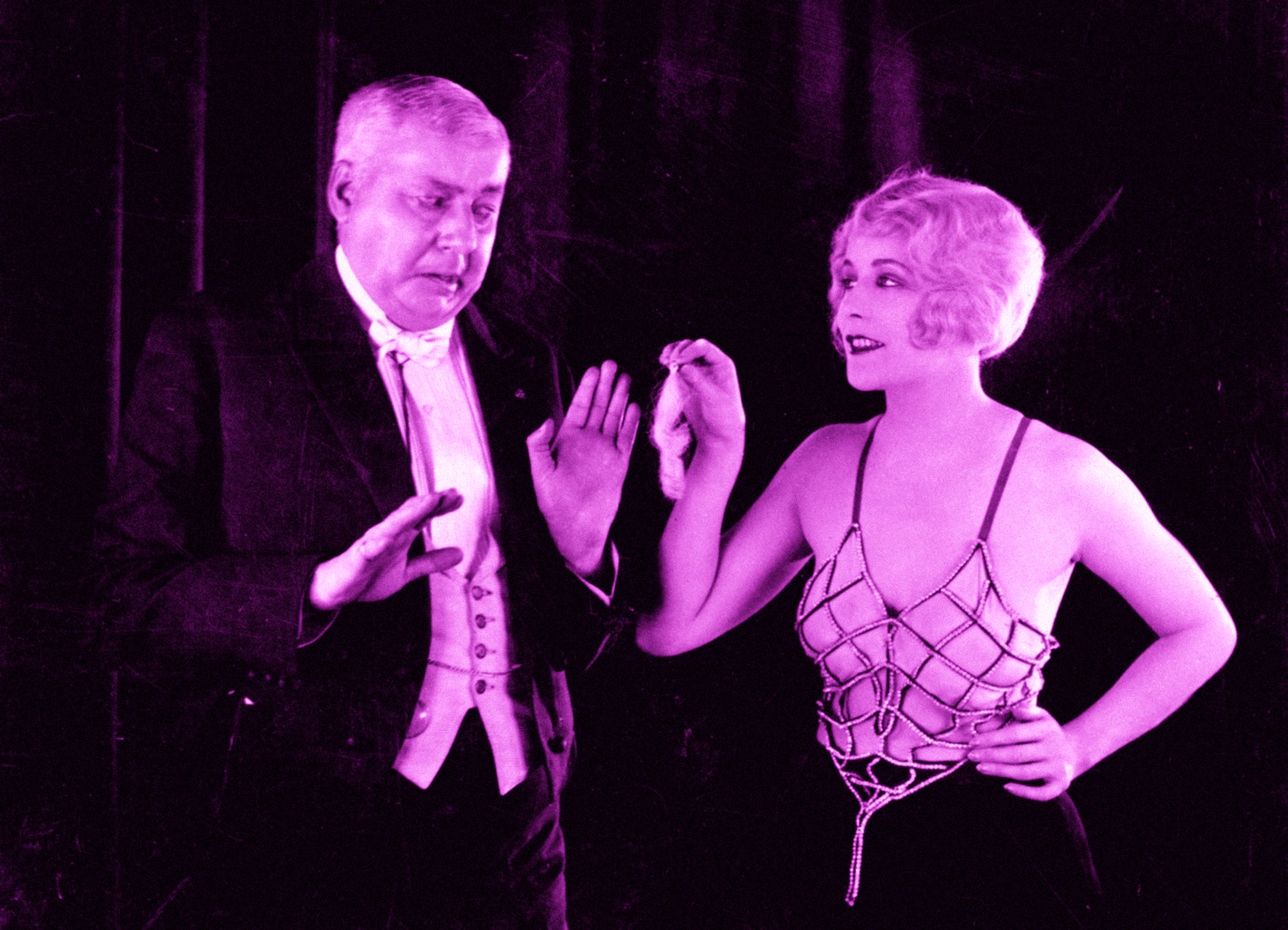 An amorous suitor and Virginia Valli in The Pleasure Garden (1925, dir. Alfred Hitchcock)